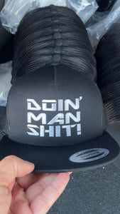 Doin’ Man Shit! BIG logo front Trucker Hat
